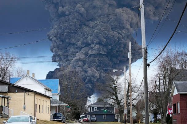 PHOTO: A large plume of smoke rises over East Palestine, Ohio, on Feb. 6, 2023, after a controlled detonation of a portion of the derailed Norfolk Southern Railway train. (Gene J. Puskar/AP)