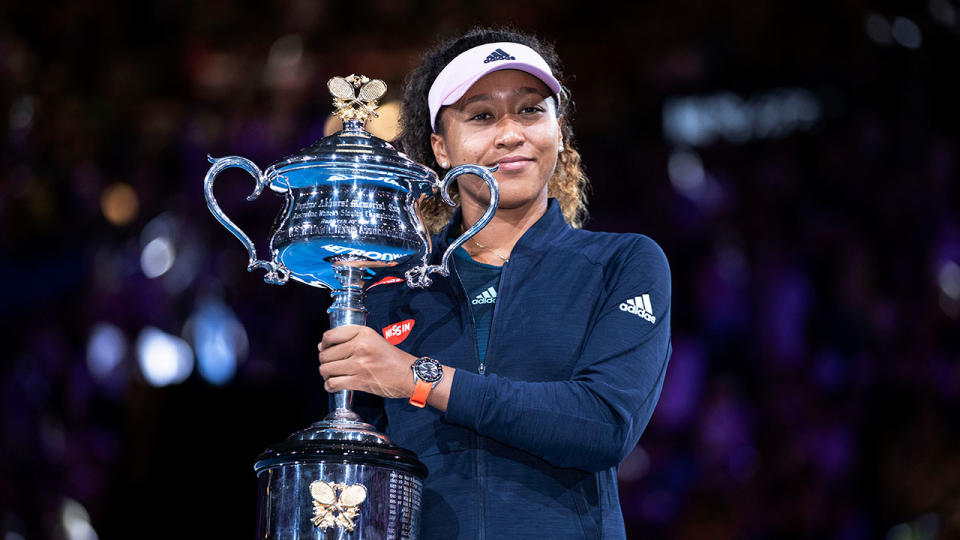 Osaka poses with the Australian Open trophy. Pic: Getty