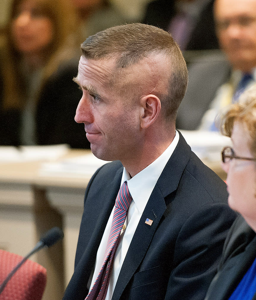 In this Feb. 24, 2014 photo, Delaware Attorney General Beau Biden attends a budget hearing at Legislative Hall in Dover. Biden says he won't seek re-election as Delaware attorney general this year but plans to run for governor in 2016. Biden, who underwent surgery at a Texas cancer center last year, announced his intentions in a statement issued Thursday, April 17, 2014. The 45-year-old Biden had said previously that he would seek a third term as attorney general. He is the oldest son of Vice President Joe Biden. (AP Photo/The Wilmington News-Journal, Jason Minto) NO SALES