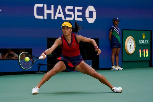 <strong>Emma Raducanu returns a shot to Belinda Bencic.</strong> (Photo: via Associated Press)