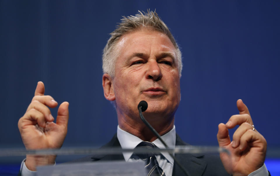 FILE - In this Monday, Nov. 27, 2017, file photo, actor Alec Baldwin speaks during the Iowa Democratic Party's fall gala, in Des Moines, Iowa. Baldwin, known for his mocking impersonations of President Donald Trump on "Saturday Night Live," is coming to Virginia to help Democratic legislative candidates. Baldwin is set to knock on doors, make calls and deliver pizza to volunteers at multiple stops around Virginia on Tuesday, Oct. 22, 2019. (AP Photo/Charlie Neibergall, File)