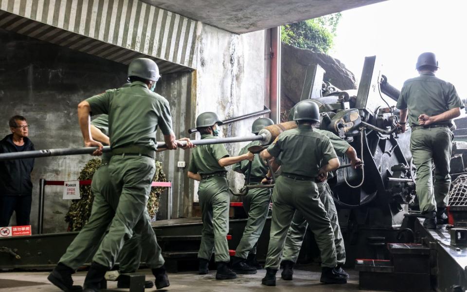 A demonstration of loading the 8-inch howitzer at the Shishan Howitzer Front in Kinmen, Taiwan, on Wednesday, May 22, 2024.