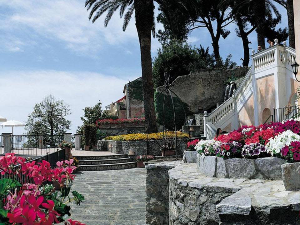 <p><b>5. Palazzo Avino</b></p>Palazzo Avino is located on Italy's famed Amalfi coast and is considered to be the fifth best hotel in the world. Tucked away in the medieval hilltop village of Ravello and perched high on the cliffs, the hotel overlooks some of the coast's most picturesque fishing villages.<p>Readers’ Choice Rating: 98.5</p><p>Room: 100</p><p>Service: 96.3</p><p>Food: 96.3</p><p>Location: 100</p><p>Design: 100</p><p>(Image source: Hotel Website)</p>