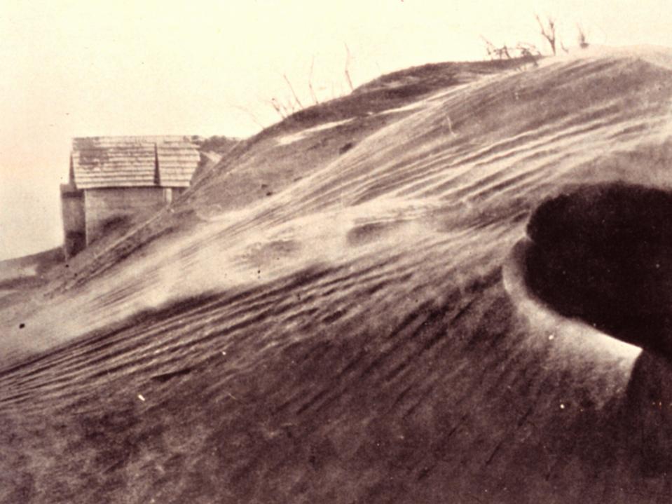 A farm on the Great Plains buried in dust in 1935.