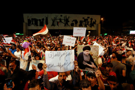 Supporters of Iraqi Shi'ite cleric Moqtada al-Sadr gather during a protest calling for neutrality during the ongoing tensions between neighbouring Iran and the USA, in Baghdad, Iraq May 24, 2019. REUTERS/Alaa Al-Marjani