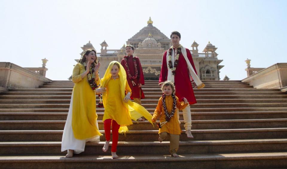 The family have been criticised for the numerous staged photos of them wearing traditional Indian clothing (AP)