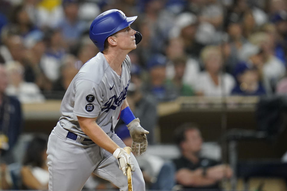 Los Angeles Dodgers' Will Smith watches his home run during the eighth inning of the team's baseball game against the San Diego Padres, Wednesday, Aug. 25, 2021, in San Diego. (AP Photo/Gregory Bull)