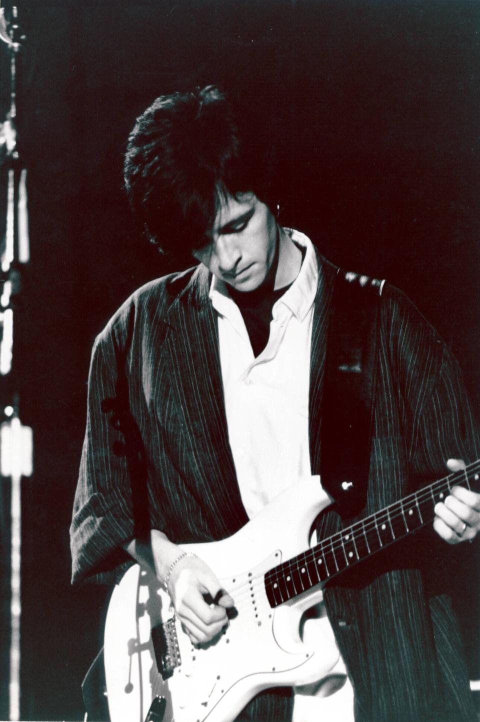 Playing his Fender Stratocaster, 1980s. (Credit: Donna Santisi/Redferns)