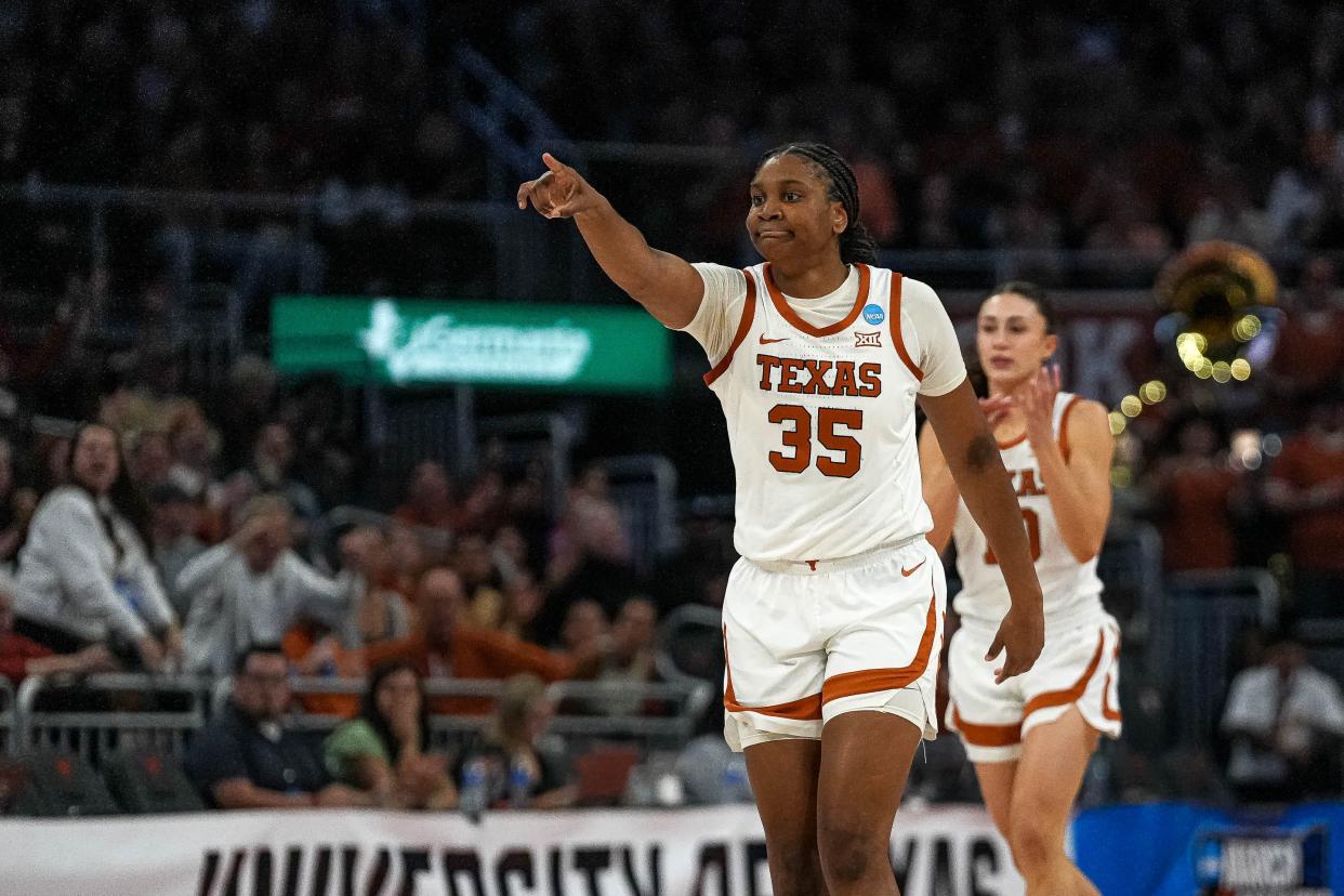 Texas forward Madison Booker celebrates a score during the game against Alabama.
