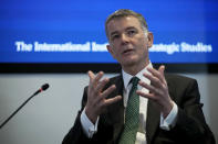 Richard Moore, the Chief of Britain's Secret Intelligence Service, also known as MI6, answers questions after giving his first public speech since becoming head of the organisation, at the International Institute for Strategic Studies, in London, Tuesday, Nov. 30, 2021. China, Russia and Iran pose three of the biggest threats to the U.K. in a fast-changing, unstable world, the head of Britain's foreign intelligence agency said Tuesday. (AP Photo/Matt Dunham)