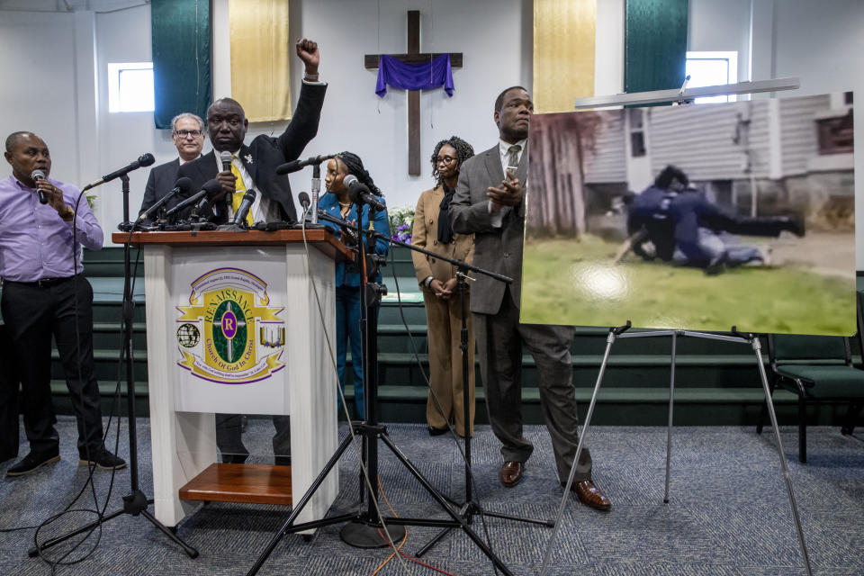 Civil rights attorney Ben Crump raises his fist while speaking during a press conference at the Renaissance Church of God in Christ Family Life Center in Grand Rapids on Thursday, April 14, 2022. Crump is representing the family of Patrick Lyoya, who was shot and killed by a GRPD officer on April 4. (Cory Morse/The Grand Rapids Press via AP)