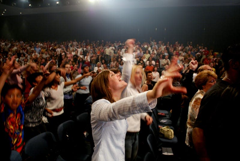 Devoted Christians celebrating Easter Sunday at the Hillsong Church at Baulkham Hills in Sydney, 11 April 2004. - Photo: Fairfax Media (Getty Images)