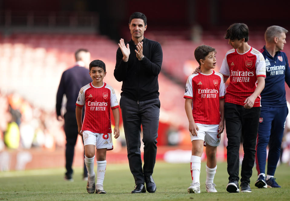 Arsenal manager Mikel Arteta and family on a lap of honour following the end of the 2022/23 English Premier League.