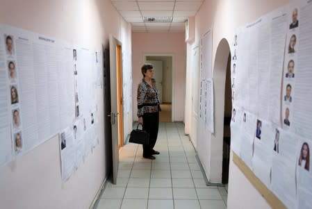 A voter visits a polling station during Ukraine's parliamentary election in Kiev