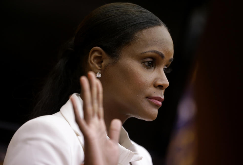 FILE - Tameka Foster Raymond takes the witness stand during a child custody hearing with her ex-husband, R&B singer Usher, Aug. 9, 2013, in Atlanta. Foster is calling to drain Lake Lanier, Georgia's largest lake, where her son was fatally injured 11 years ago. Kile Glover, her 11-year-old son with Bounce TV chairman Ryan Glover, died in July 2012 after a personal watercraft struck the boy as he floated in an inner tube on the lake. (AP Photo/David Goldman, File)