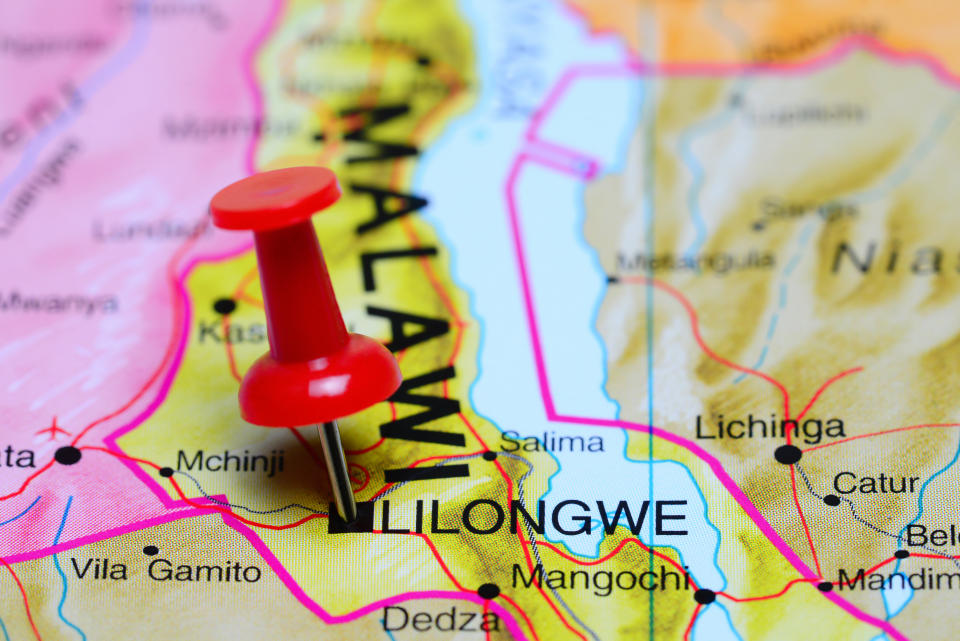 Photo of pinned Lilongwe on a map of Africa. May be used as illustration for traveling theme.