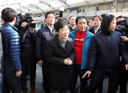 South Korean President Park Geun-hye visits the scene of a fire (not pictured) at a traditional market in Daegu, South Korea, December 1, 2016. Lee Jong-hyun/News1 via REUTERS