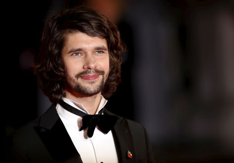 FILE PHOTO: Ben Whishaw poses for photographers on the red carpet at the world premiere of the new James Bond 007 film "Spectre" at the Royal Albert Hall in London