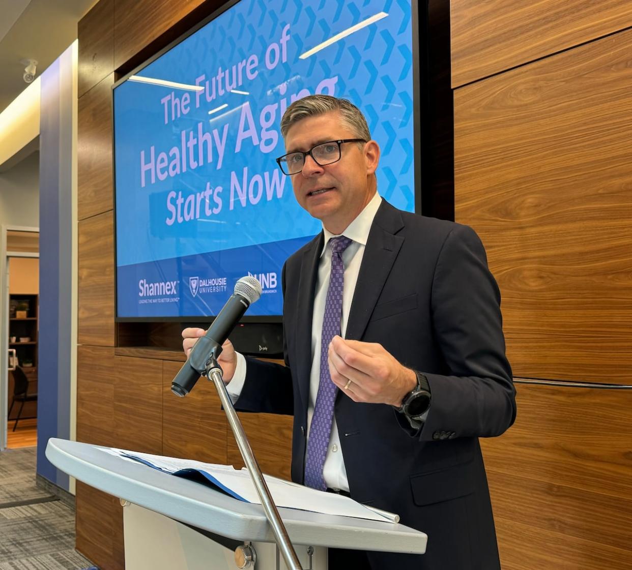 Shannex president Jason Shannon addresses the crowd as his company donates $3.5 million to three universities to assist with healthy aging research. (Paul Palmeter/CBC - image credit)