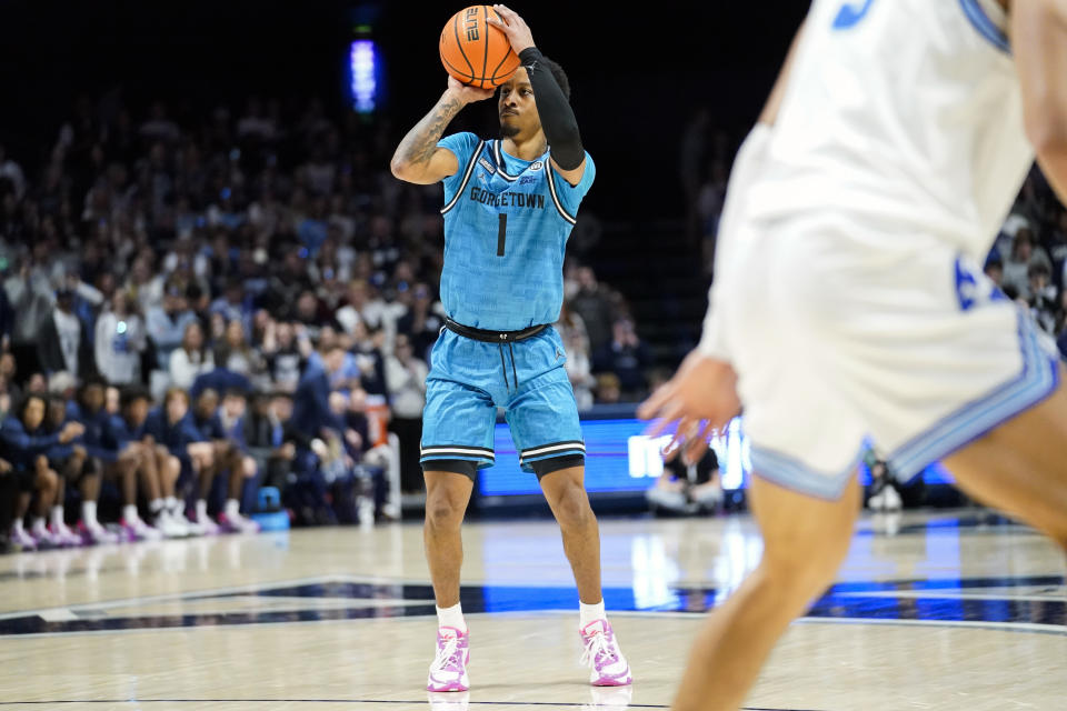 Georgetown guard Primo Spears (1) shoots during the first half of an NCAA college basketball game against Xavier, Saturday, Jan. 21, 2023, in Cincinnati. (AP Photo/Joshua A. Bickel)