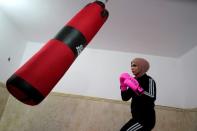 Bushra al-Hajjar trains in Najaf; more than 100 women boxers competed in a December tournament (AFP/Qassem al-KAABI)