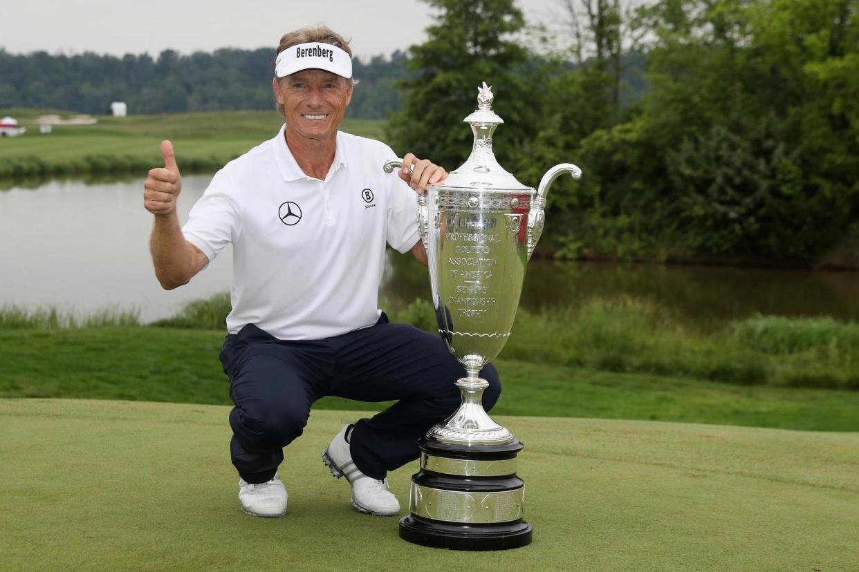 History Maker | Langer poses with the trophy after winning the Senior PGA Championship at Trump National Golf Club: Rob Carr/Getty Images