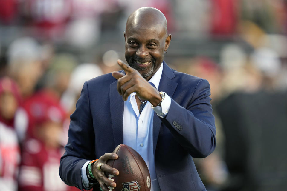 FILE - Jerry Rice gestures before an NFL football game between the San Francisco 49ers and the Los Angeles Chargers in Santa Clara, Calif., Sunday, Nov. 13, 2022. Brenden Rice, a wide received like his Hall of Fame dad, caught passes from projected No. 1 overall pick Caleb Williams at USC, is viewed as a mid-rounder in the NFL Draft.(AP Photo/Godofredo A. Vásquez, File)