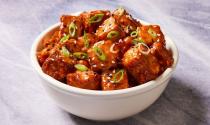 <p>To get crispy tofu you'd typically need to heat up a bunch of oil, worrying about over cooking or a messy clean-up. But, the air fryer makes getting perfect golden brown tofu a cinch.</p><p>Get the <a href="https://www.delish.com/uk/cooking/recipes/a38409839/air-fryer-tofu-recipe/" rel="nofollow noopener" target="_blank" data-ylk="slk:Air Fryer Tofu;elm:context_link;itc:0;sec:content-canvas" class="link ">Air Fryer Tofu</a> recipe.</p>