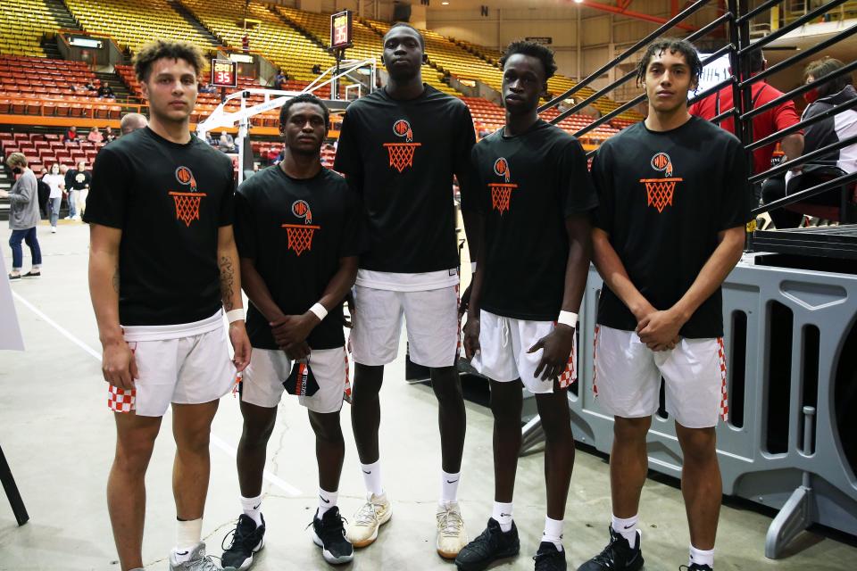 Washington's starting lineup for Saturday's third-place game vs. Yankton: Akok Aguer, Eli Williams, Tahj Two Bulls, Mikele Kambalo and Angok Akot.