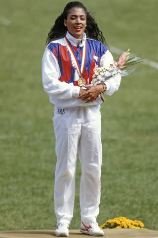 <p>David Madison/Getty</p> Florence Griffith Joyner