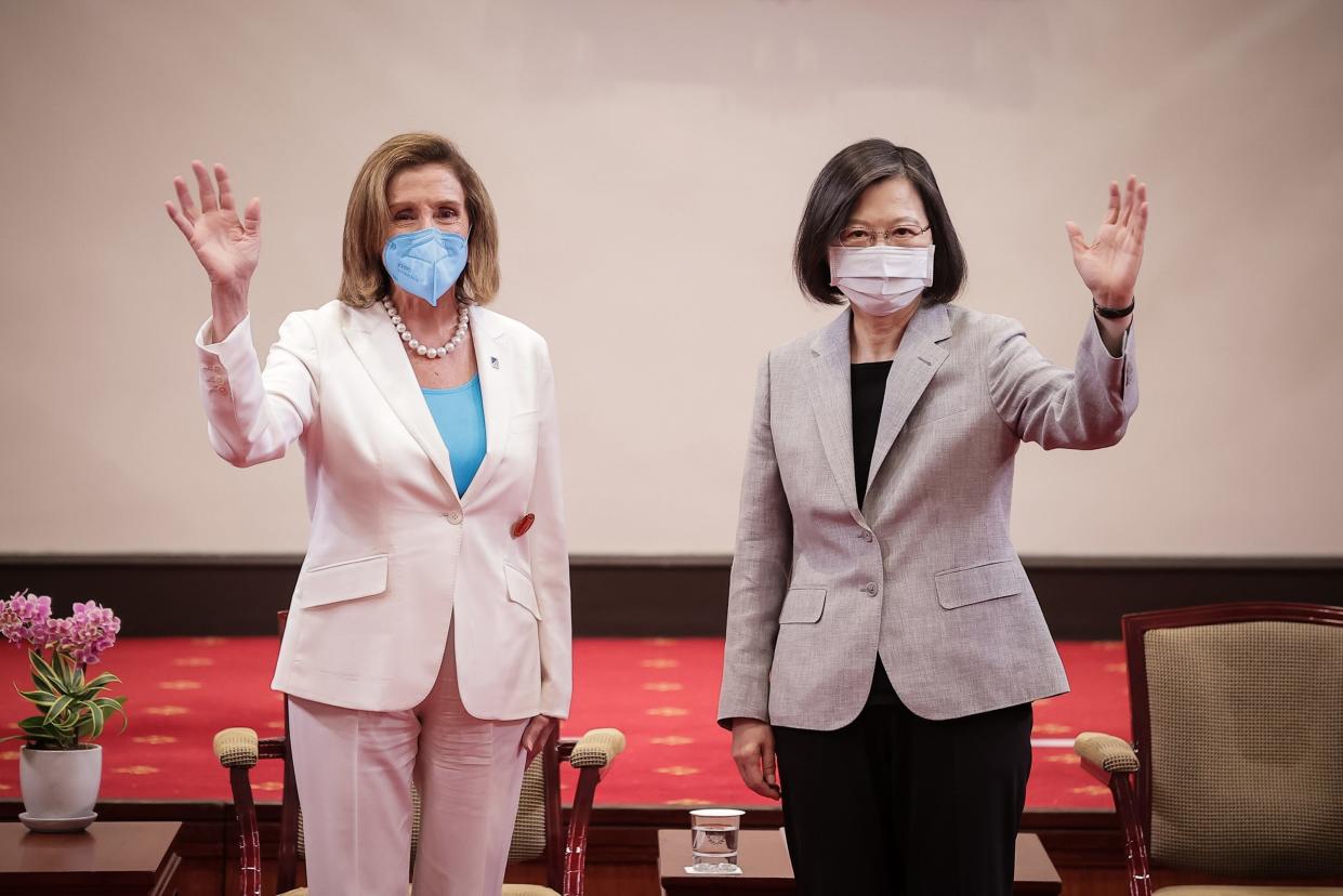 Speaker of the U.S. House Of Representatives Nancy Pelosi (D-CA), left, poses for photographs with Taiwan's President Tsai Ing-wen, right, at the president's office on August 03, 2022 in Taipei, Taiwan. Pelosi arrived in Taiwan on Tuesday as part of a tour of Asia aimed at reassuring allies in the region, as China made it clear that her visit to Taiwan would be seen in a negative light.