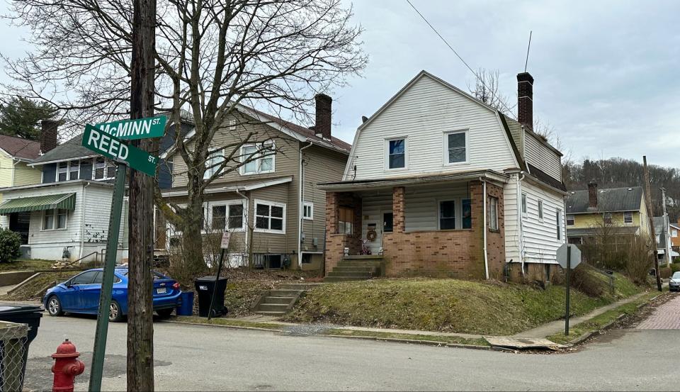 Authorities removed more than 150 reptiles including venomous snakes and an alligator from this home at the corner of McMinn and Reed streets in Aliquippa on March 22, 2023. A man was found dead inside after apparently been bitten by a snake.