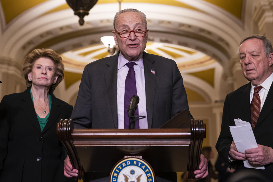 WASHINGTON, DC - DECEMBER 13: Senate Majority Leader Sen. Chuck Schumer (D-NY) speaks to the media along side Sen. Debbie Stabenow (D-MI) and Sen. Dick Durbin (D-IL) during the weekly Senate Democrat Leadership press conference at the US Capitol on December 13, 2022 in Washington, DC. Democrats spoke about averting a government shutdown and the signing of the Respect for Marriage Act. (Photo by Nathan Howard/Getty Images)