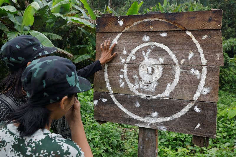 The Wider Image: In Myanmar jungle, civilians prepare to battle military rulers