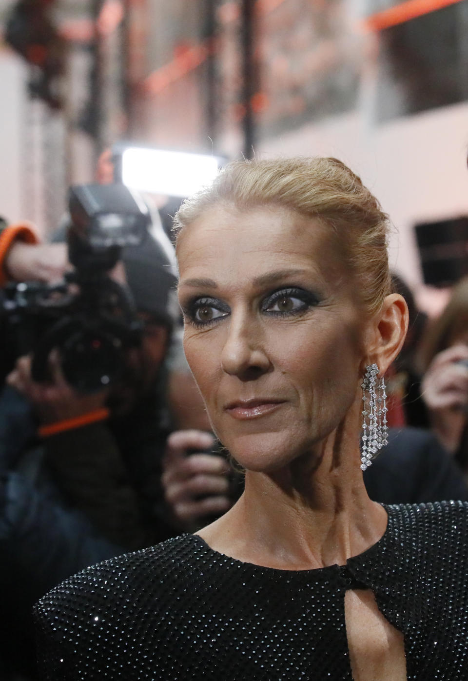 Singer Celine Dion arrives for the Vauthier Spring/Summer 2019 Haute Couture fashion collection presented in Paris, Tuesday Jan. 22, 2019. (AP Photo/Francois Mori)