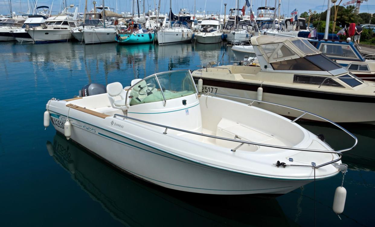 Antibes, France - May 6, 2013: Anchored boat in Port Grimaldi on the French Riviera.