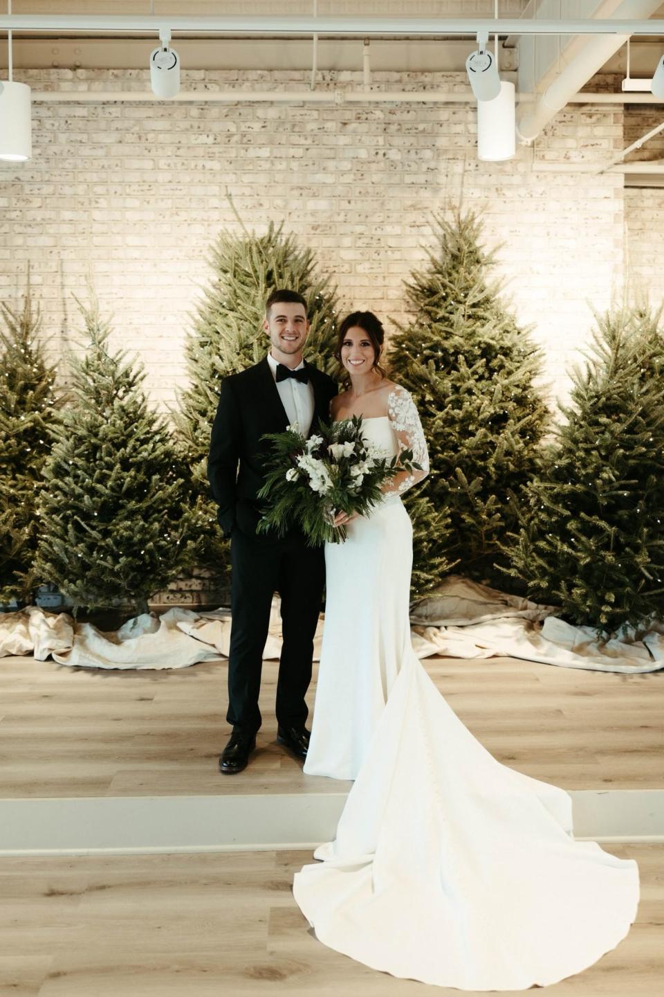 Spencer and Mallory Gritsch on their wedding day at Toast, a wedding venue in Ankeny.