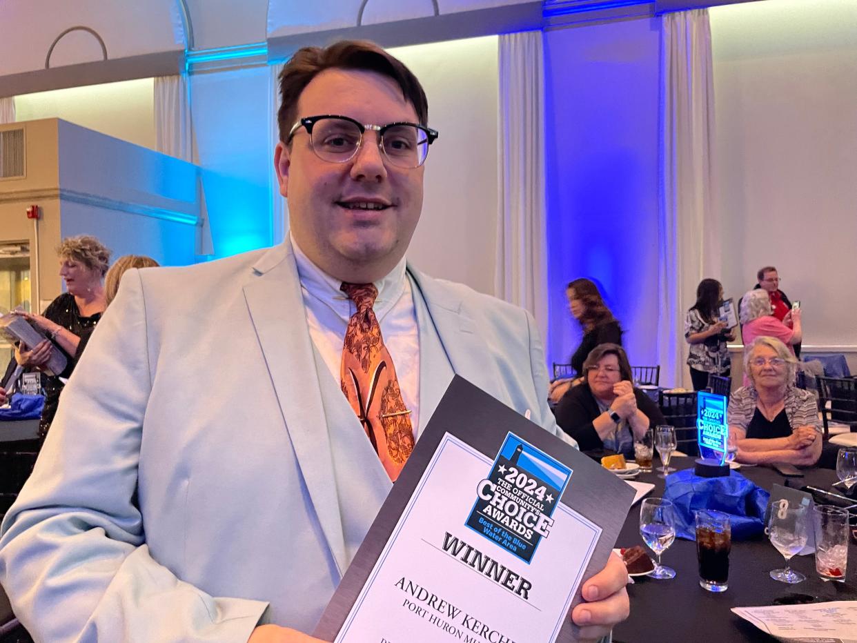 Port Huron Museums Community Engagement Manager Andrew Kercher holding his Person of the Year Award at the Best of the Best awards on April 24, 2024.