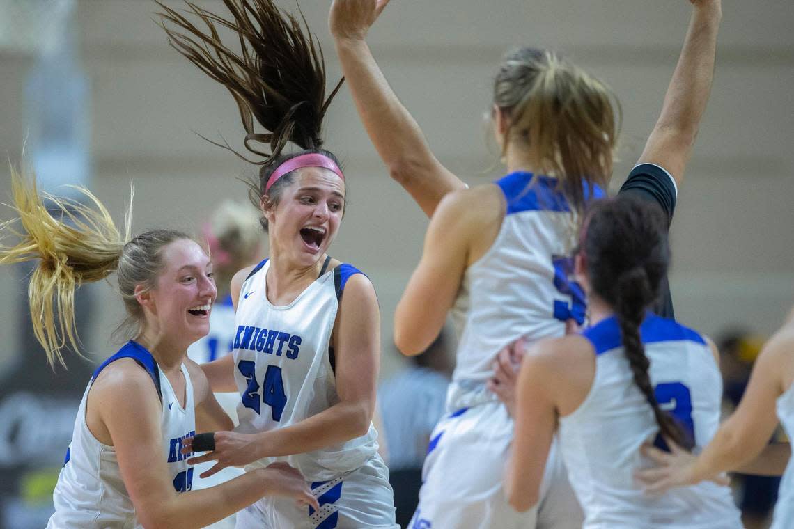 Lexington Catholic celebrates after beating Franklin County during the 11th Region semifinals in Richmond on Wednesday night. “I knew it was going to be a battle down to the wire,” Knights Coach Lee Tegt said.