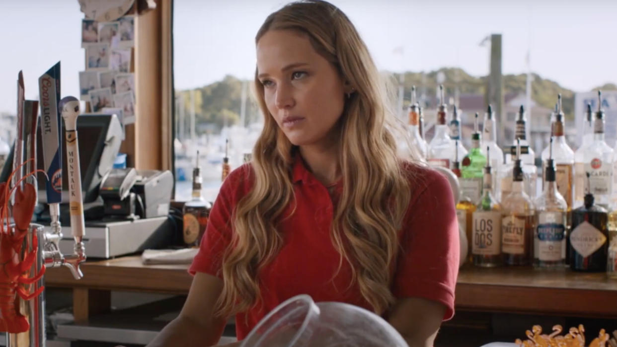  Jennifer Lawrence working at a bar in No Hard Feelings. 