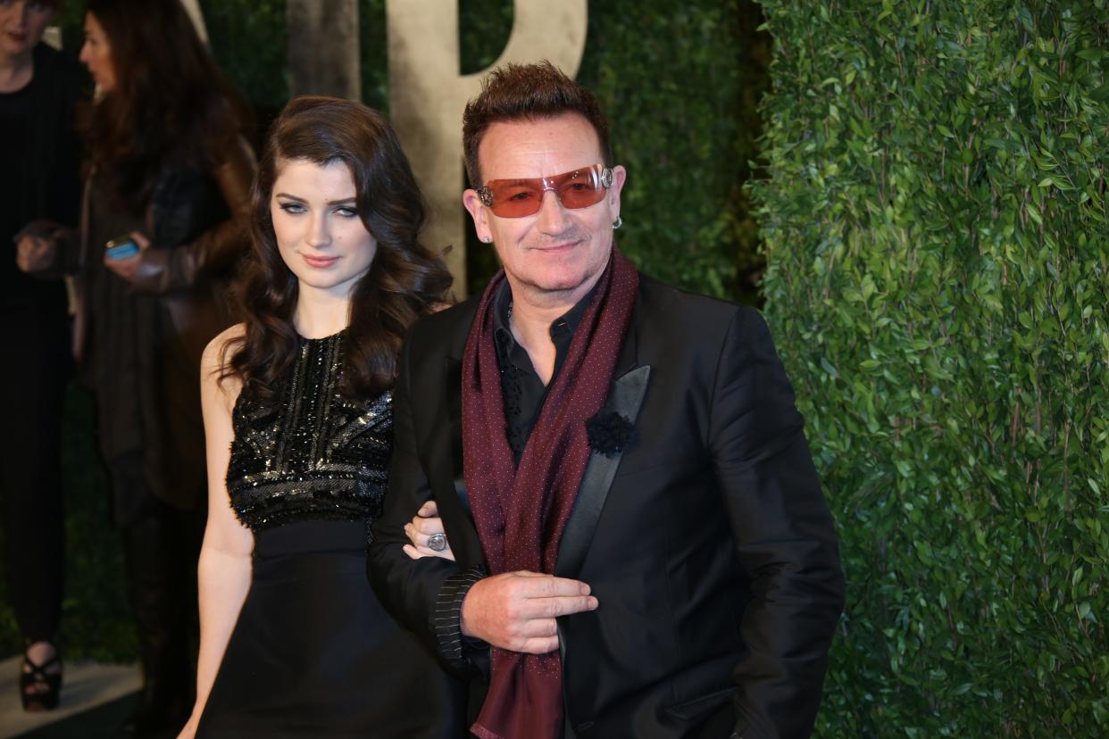 Singer Bono and his daughter Eve Hewson arrive at the Vanity Fair Oscar Party at Sunset Tower in West Hollywood, Los Angeles, USA, on 24 February 2013. Photo: Hubert Boesl/dpa | usage worldwide   (Photo by Hubert Boesl/picture alliance via Getty Images)