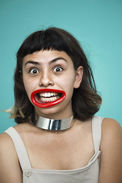 Woman with hyperLip selfie accessory