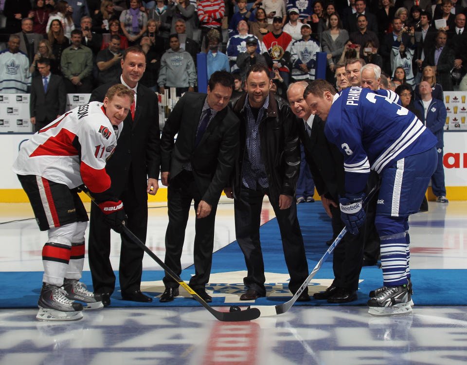 TORONTO, ON - NOVEMBER 12: (L-R) Joe Nieuwendyk, Doug Gilmour, Ed Belfour and Mark Howe prepare for the ceremonial faceoff prior between Daniel Alfredsson #11 of the Ottawa Senatoras nd Dion Phaneuf #3 of the Toronto Maple Leafs at the Air Canada Centre on November 12, 2011 in Toronto, Ontario, Canada. (Photo by Bruce Bennett/Getty Images)