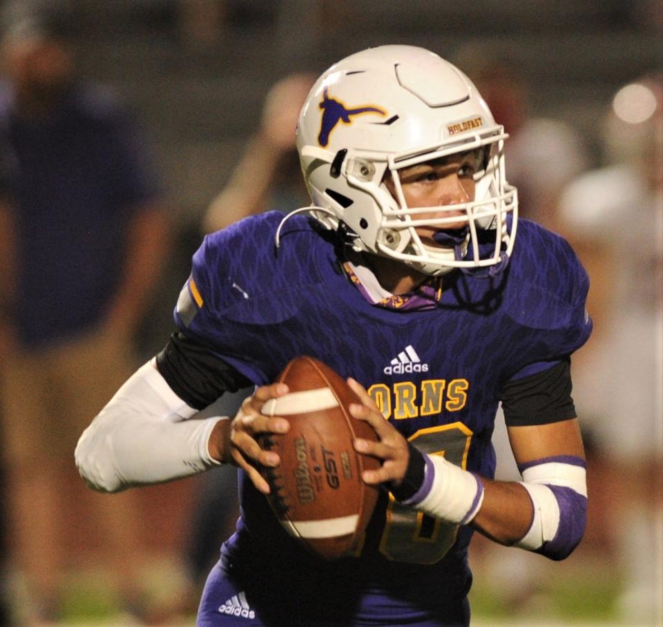 Early quarterback Jaxyn Price looks for a receiver in the Longhorns' game against Jim Ned. Jim Ned won 46-14 on Friday, Oct. 9, 2020, at Longhorn Stadium in Early.