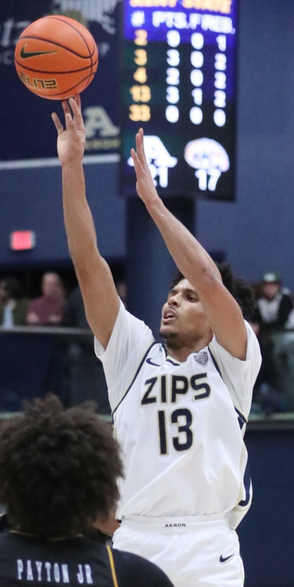 University of Akron's Xavier Castaneda shoots a three point shot against Kent State University during their MAC conference game at James  A. Rhodes Arena in Akron on Friday.