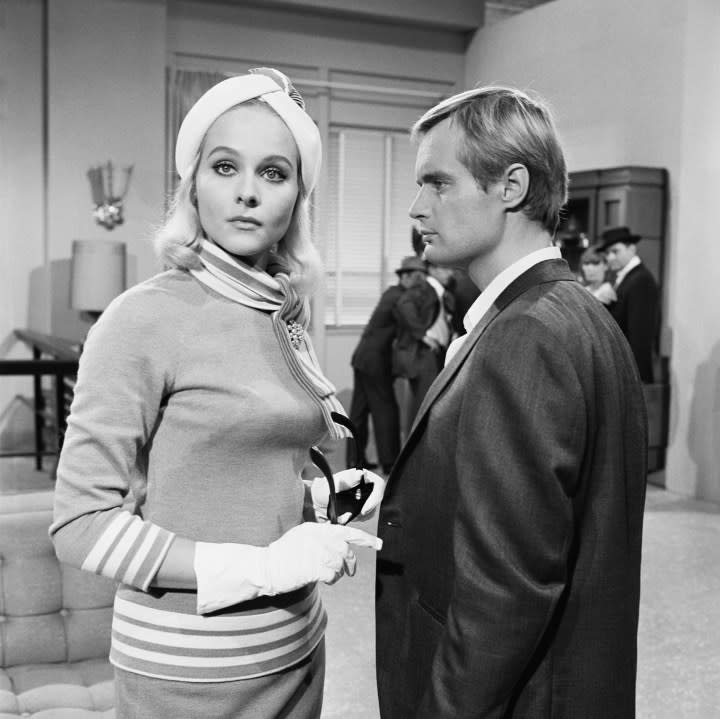 THE MAN FROM U.N.C.L.E. — “The Deadly Toys Affair” Episode 209 — Pictured: (l-r) Diane McBain as Joanna Lydecker, David McCallum as Illya Kuryakin — (Photo by: NBCU Photo Bank/NBCUniversal via Getty Images via Getty Images)