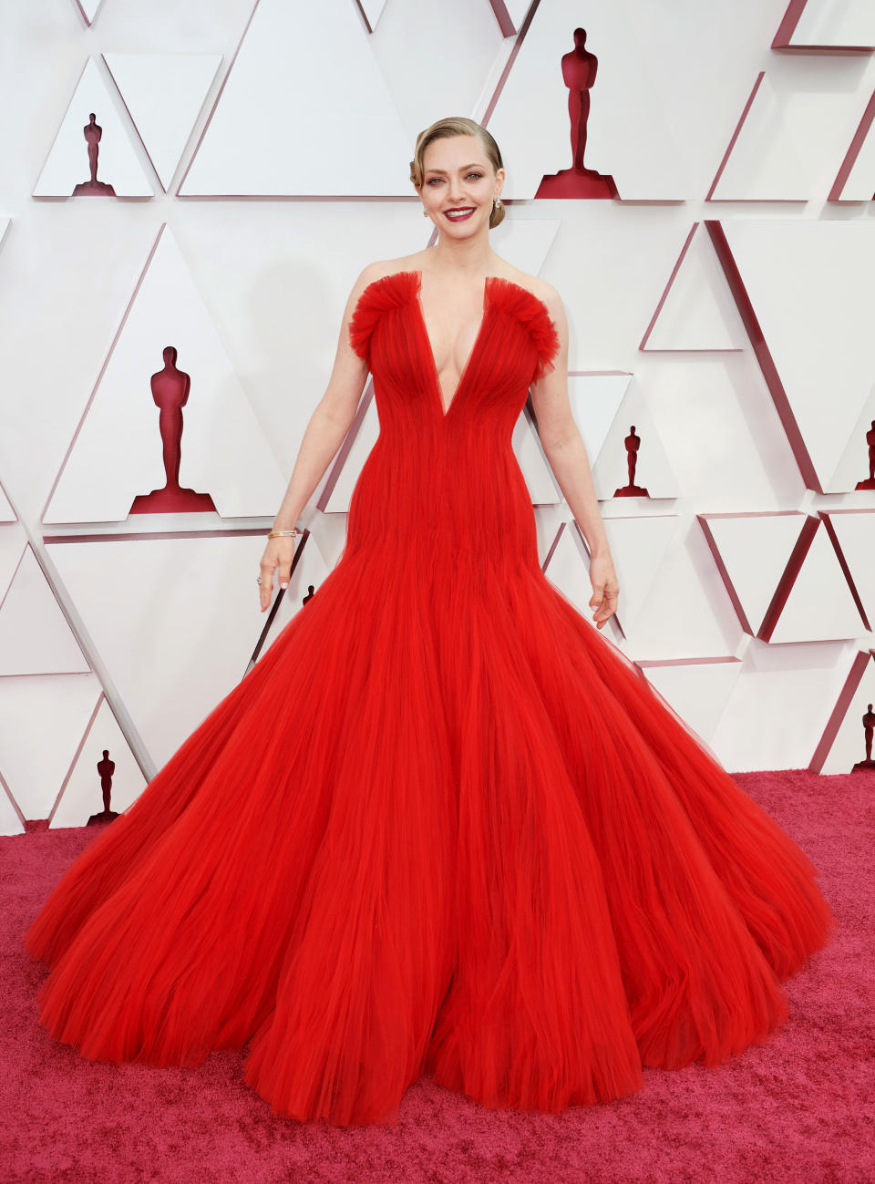 <p>Amanda Seyfried matched the red carpet in Armani Privé in 2021. (Getty Images)</p> 