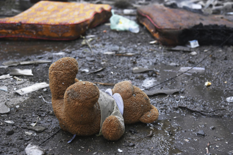 A teddy bear lies among damage in a residential area after shelling by Azerbaijan's artillery during a military conflict in self-proclaimed Republic of Nagorno-Karabakh, Stepanakert, Azerbaijan, Sunday, Oct. 4, 2020. The clashes erupted on Sept. 27 and have killed dozens, marking the biggest escalation in the decades-old conflict over the region, which lies within Azerbaijan but is controlled by local ethnic Armenian forces backed by Armenia. (David Ghahramanyan/NKR InfoCenter PAN Photo via AP)