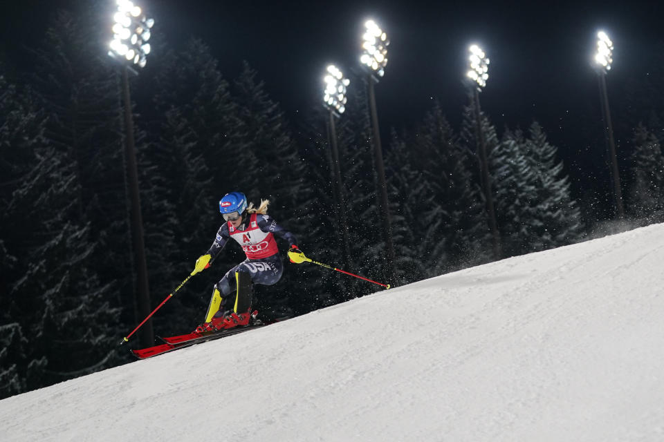 United States' Mikaela Shiffrin speeds down the course during an alpine ski, women's World Cup slalom in Flachau, Austria, Tuesday, Jan.10, 2023. (AP Photo/Giovanni Auletta)