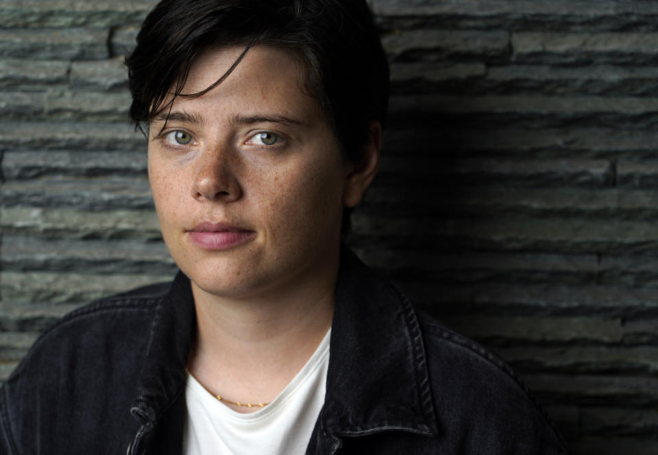 Writer-director Charlotte Wells poses for a portrait at Mother Tongue restaurant in Toronto to promote the film "Aftersun," during the 2022 Toronto International Film Festival on Sept. 12, 2022. (AP Photo/Chris Pizzello)